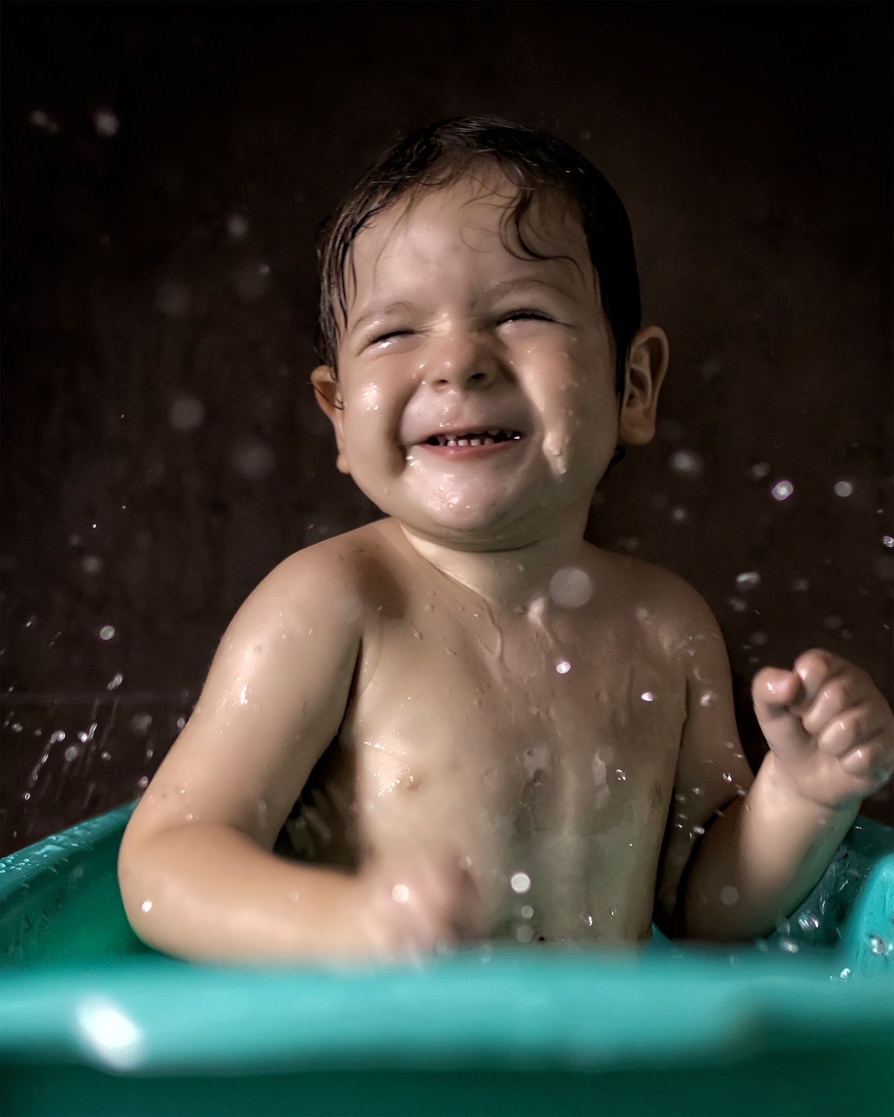 Bathroom Remodeling Near Me baby playing in tub